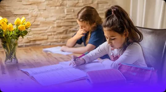 Uczniowie korzystający z kalkulatora matematycznego